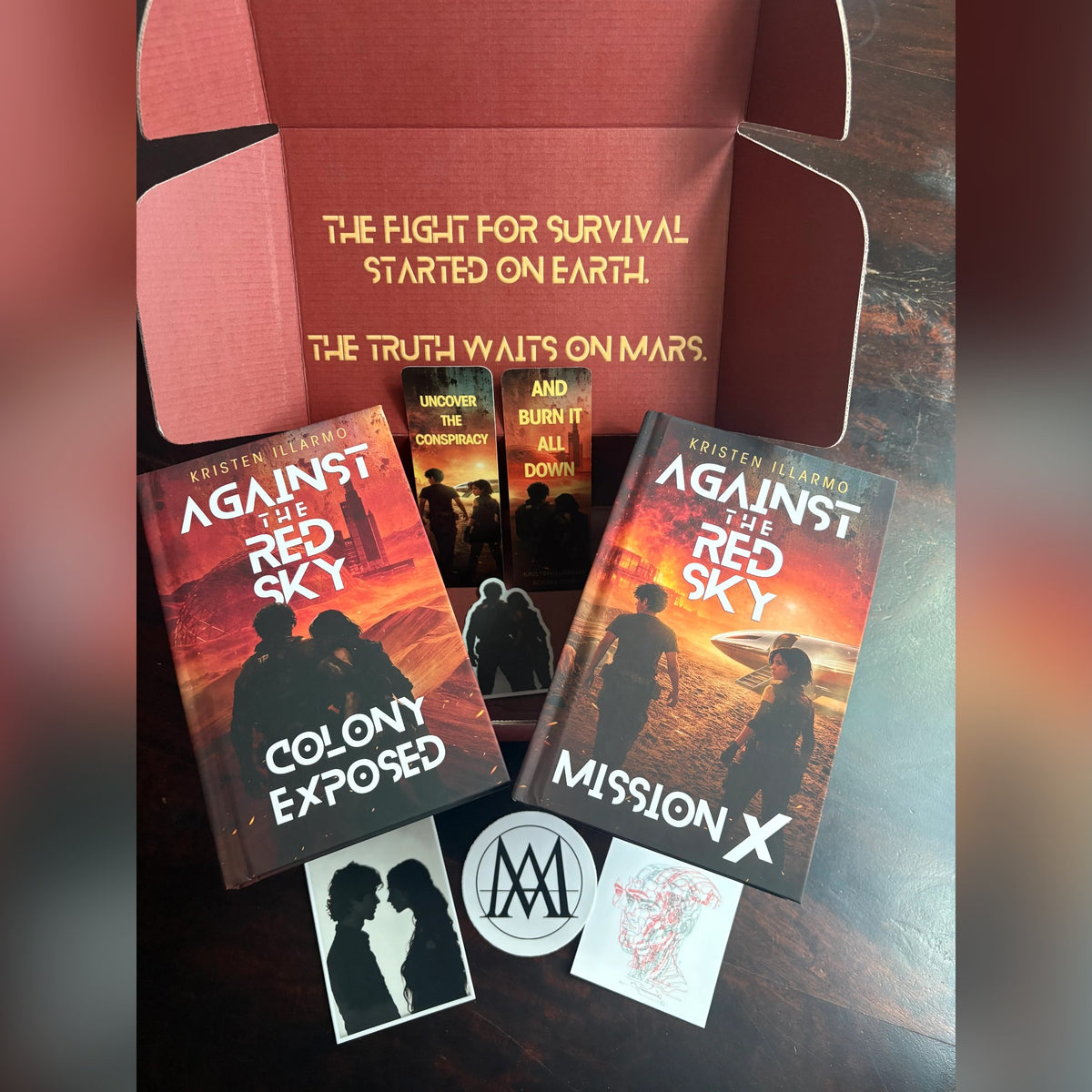 Open Against the Red Sky Book Box with both signed hardcovers, stickers and a bookmark